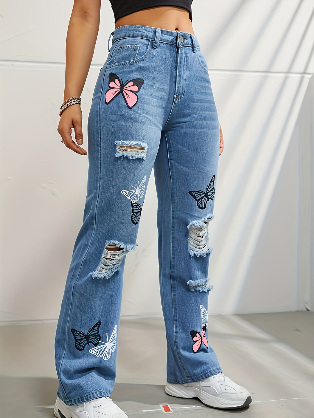 Ava | Losvallende Vlinderprint Jeans met Ripped Details voor Dames