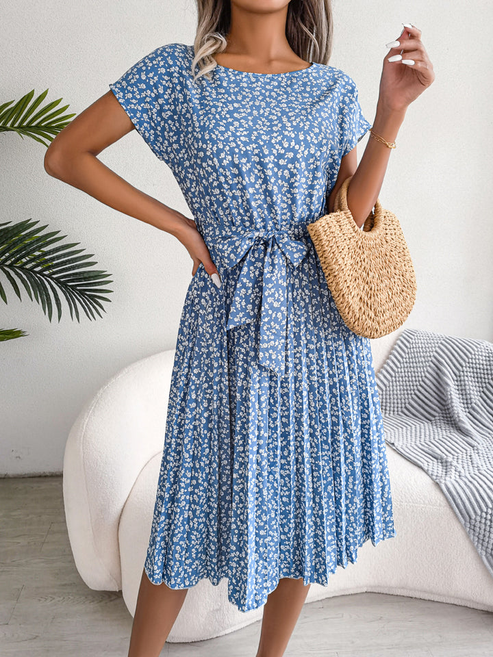 Nancy | Elegante Bloemenjurk met Plissé Rok en Ceintuur