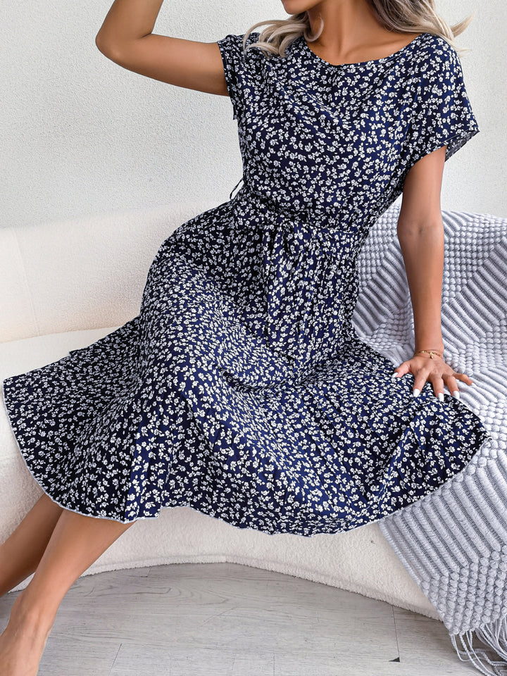 Nancy | Elegante Bloemenjurk met Plissé Rok en Ceintuur
