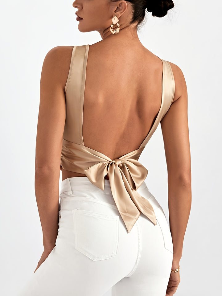 Nina | Elegante Mouwloze Top met Open Rug en Strik in Beige